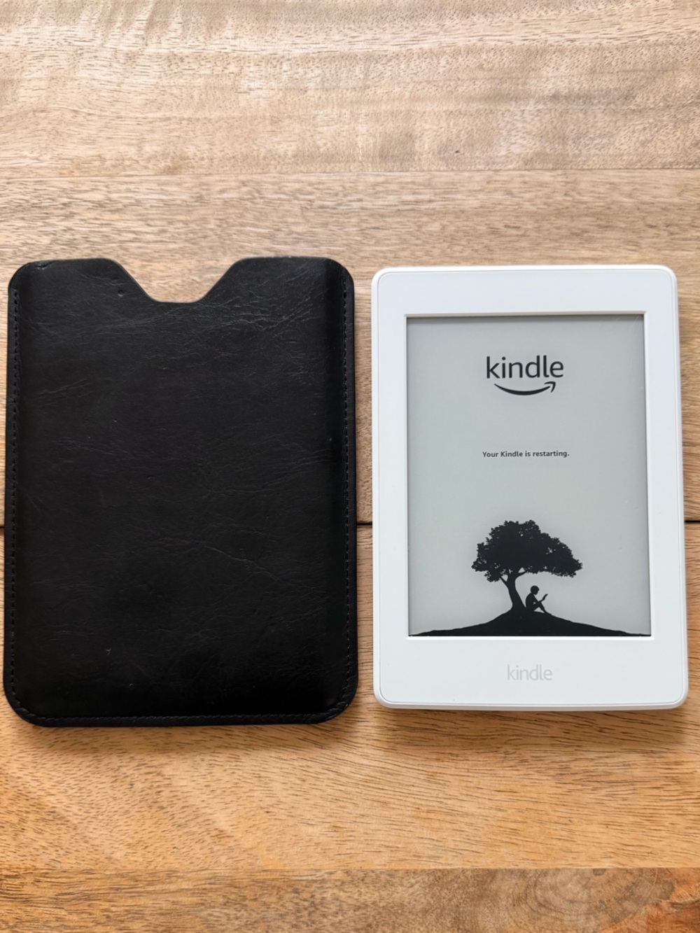Amazon paper white Kindle E-Reader (7th gen)with Black Protective Sleeve - White